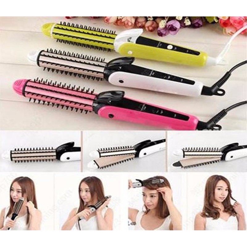 Máy uốn tóc Lược điện đa năng 3 trong 1, vừa làm xoăn, vừa là tóc, vừa dập xù tiện lợi. Lược điện đa năng 3 trong 1 với thiết kế nhỏ gọn, vừa tay cầm, bạn có thể bỏ túi mang theo bên mình