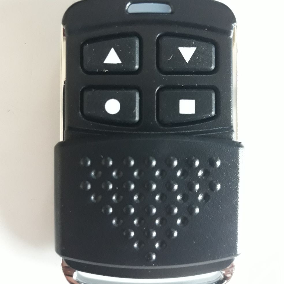 Tay điều khiển cửa cuốn- Remote cửa cuốn Austdoor 315 mhz mã nhảy
