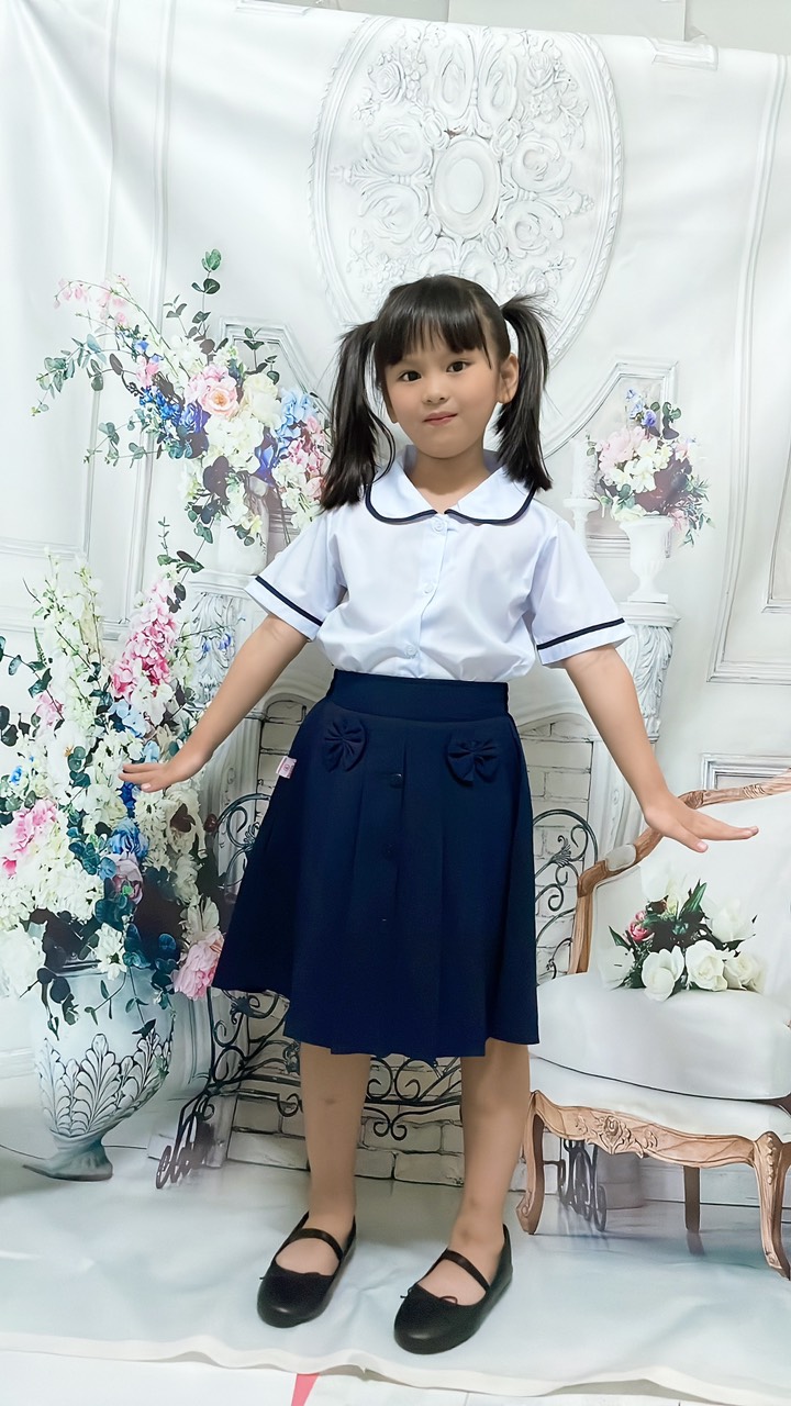 Chân váy nữ xòe có nơ 3 nút- Đồng phục học sinh