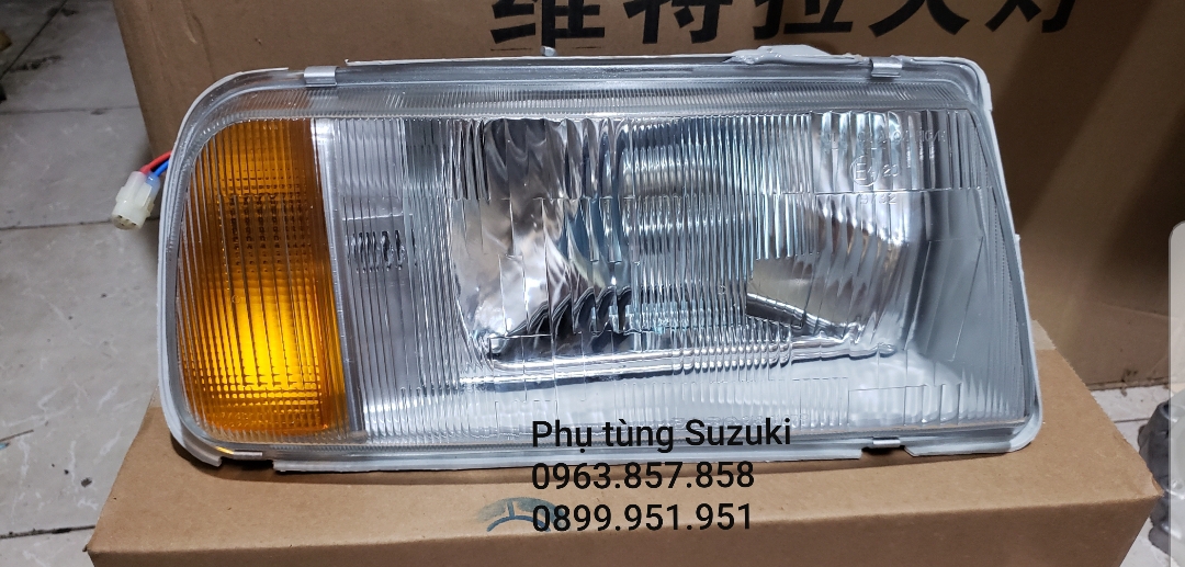 Đèn pha suzuki vitara 2004