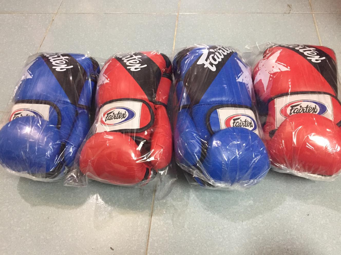 Găng Boxing faitex được làm bằng Chất liệu da PU cao cấp tặng băng quấn tay cùng hãng cao cấp 4m