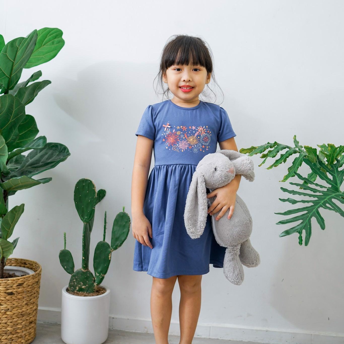 Đầm thun bé gái d140