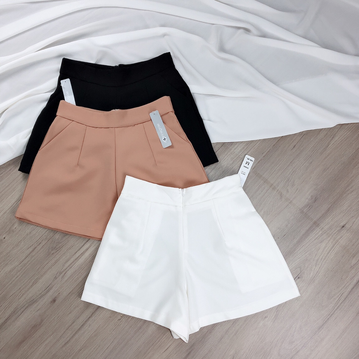 Quần short lưng cao vải tuyết mưa,ly store