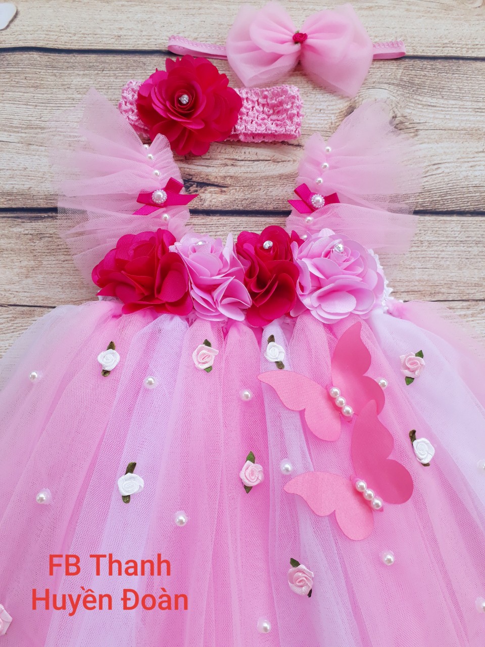 Váy bé gái tay cánh tiên hồng nhạt xem trắng hoa hồng to và nhí cho bé từ 0 - 10 tuổi