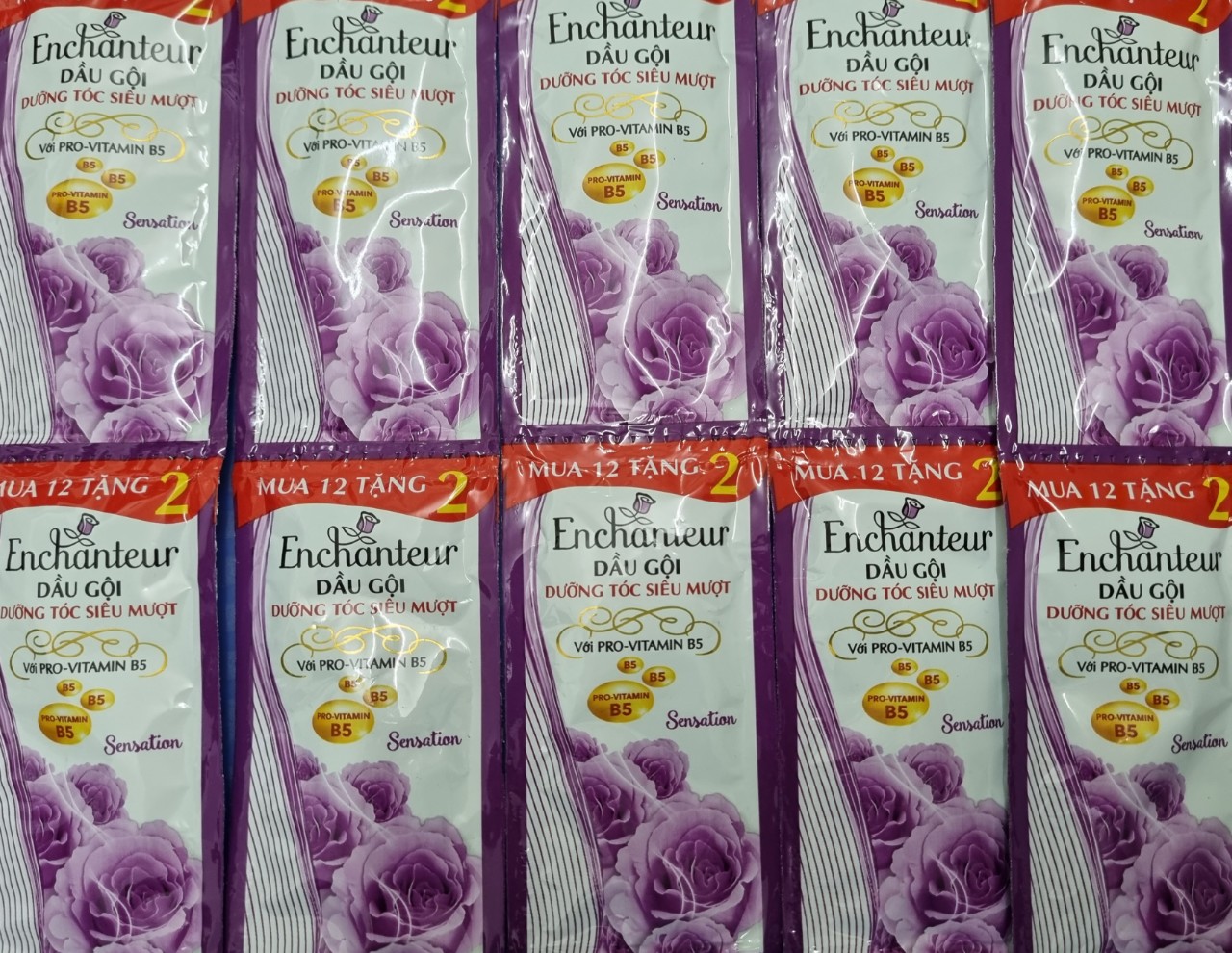 [HCM]Combo 50 gói dầu gội Enchanteur (tím)
