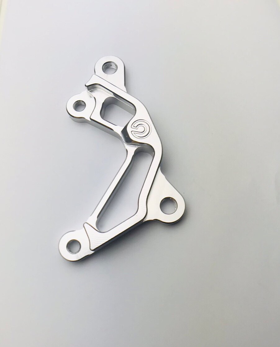 Pát trước sirius/ex2006-2010 heo 2 pis đối xứng size đĩa 260mm, nhôm cnc nguyên khối