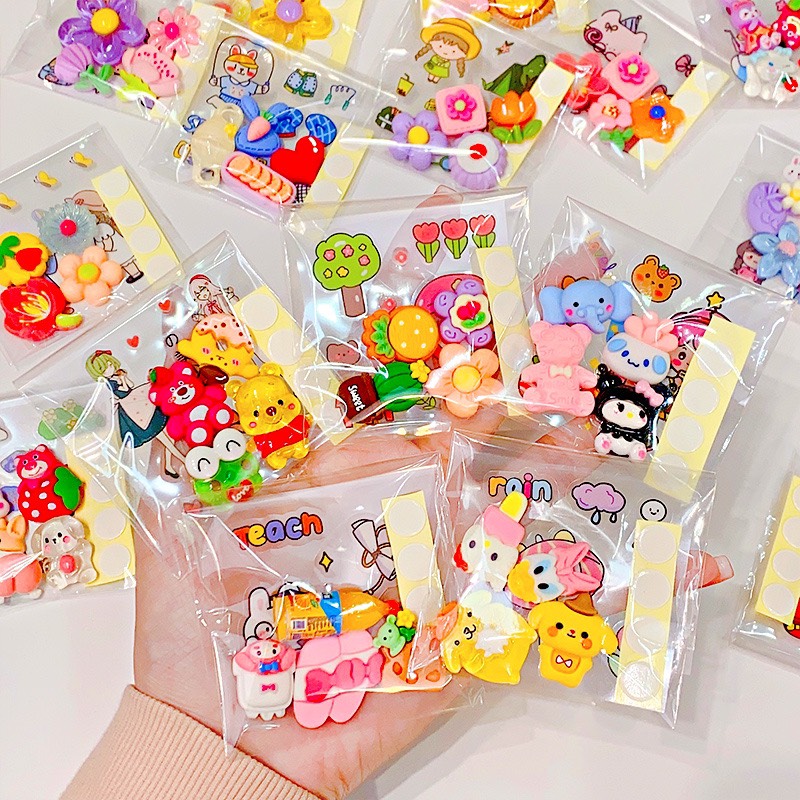 Combo gói 4 charm 1 tấm ticker và 4 miếng dán giao ngẫu nhiên nhiều mẫu nhân vật hoạt hình dễ thương trang trí giá rẻ