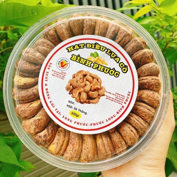 Hạt điều rang muối còn vỏ lụa - đièu xếp hoa lon 500.gram