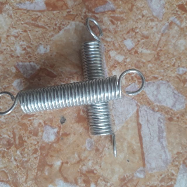 Lò xo chân chống xe đạp