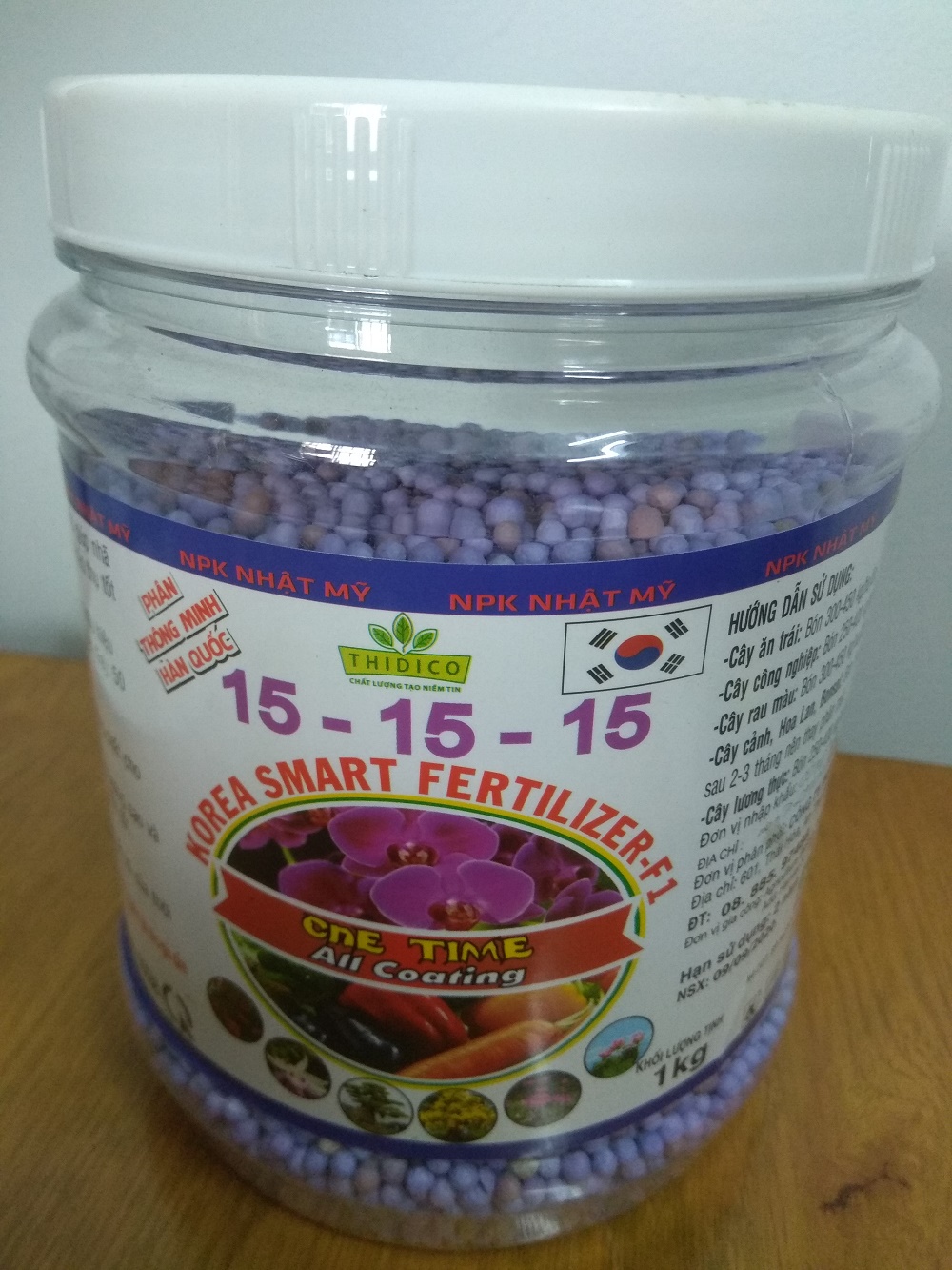 [HCM]Phân tan chậm thông minh Hàn Quốc NPK 15-15-15 - chai 1 kg