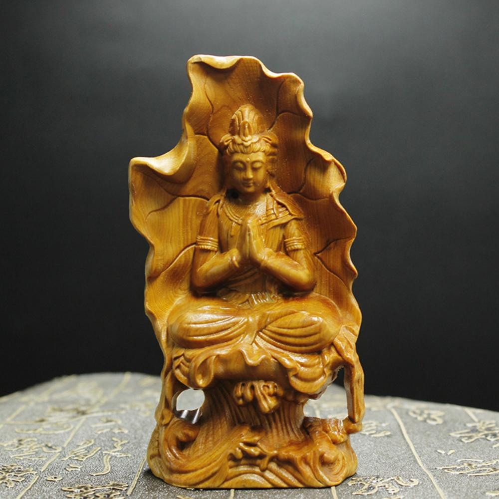 Tượng Phật bà Quan Âm Bồ Tát tựa lá sen bằng gỗ Hoàng Dương (để trong xe ô tô)