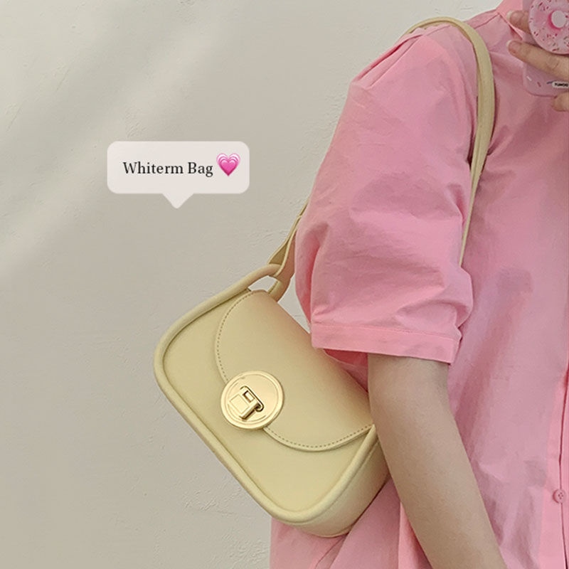 Niche design alar handbags women in the summer of 2022 the new tide fashion small bread advanced sense of western style one shoulder inclined shoulder bag