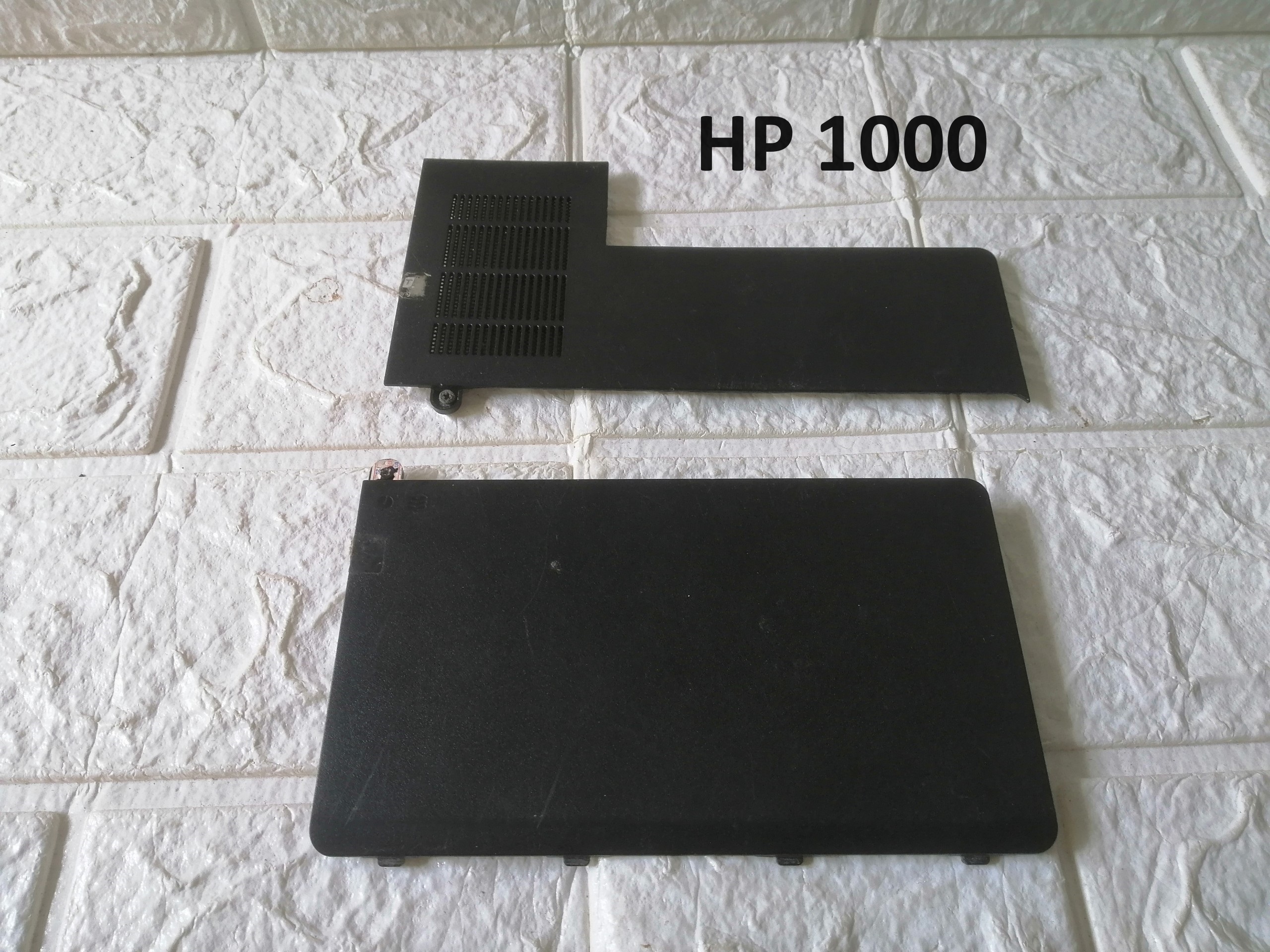 NÁP CHE RAM HDD VỎ LAPTOP HP 1000