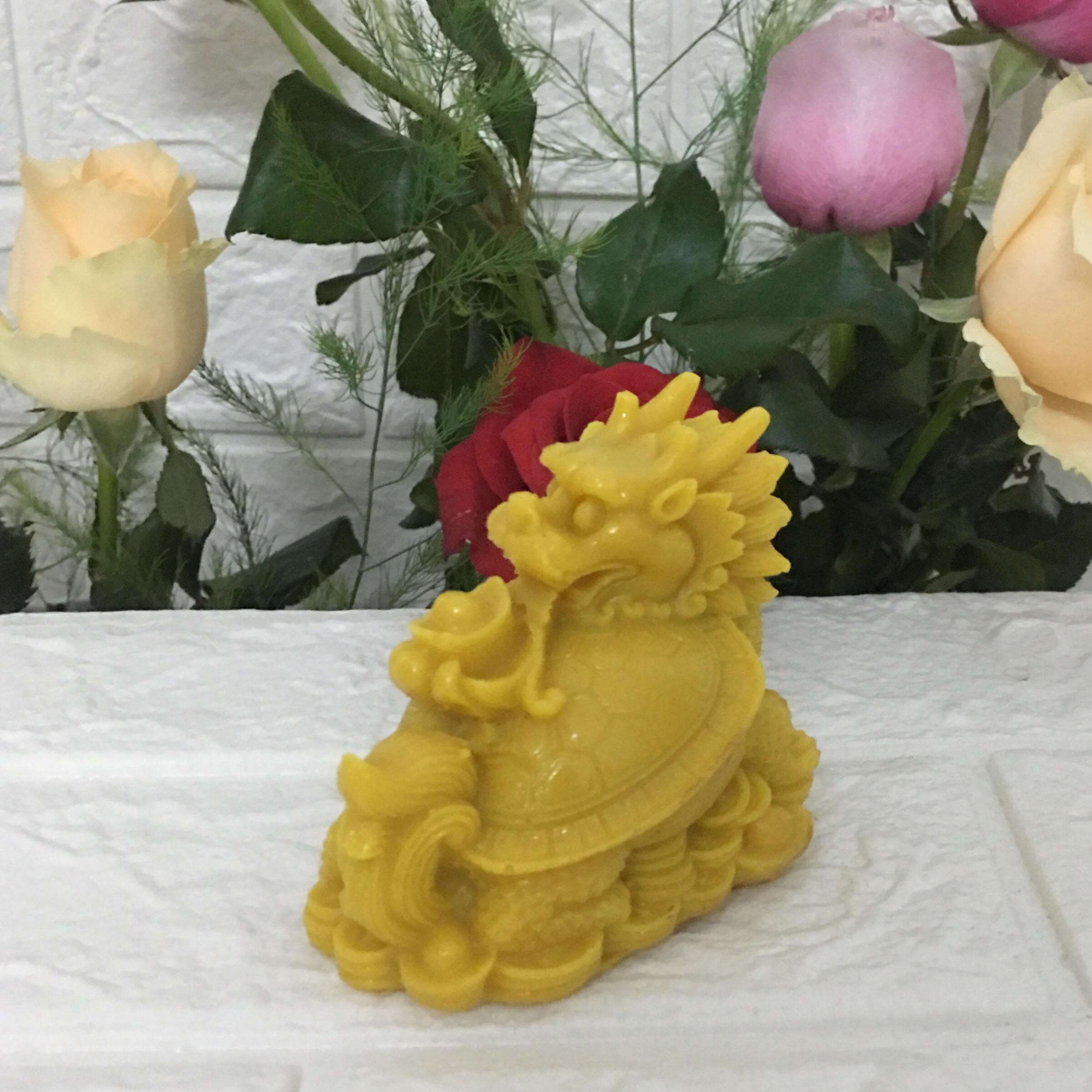 Tượng long quy mang thỏi vàng tài lộc