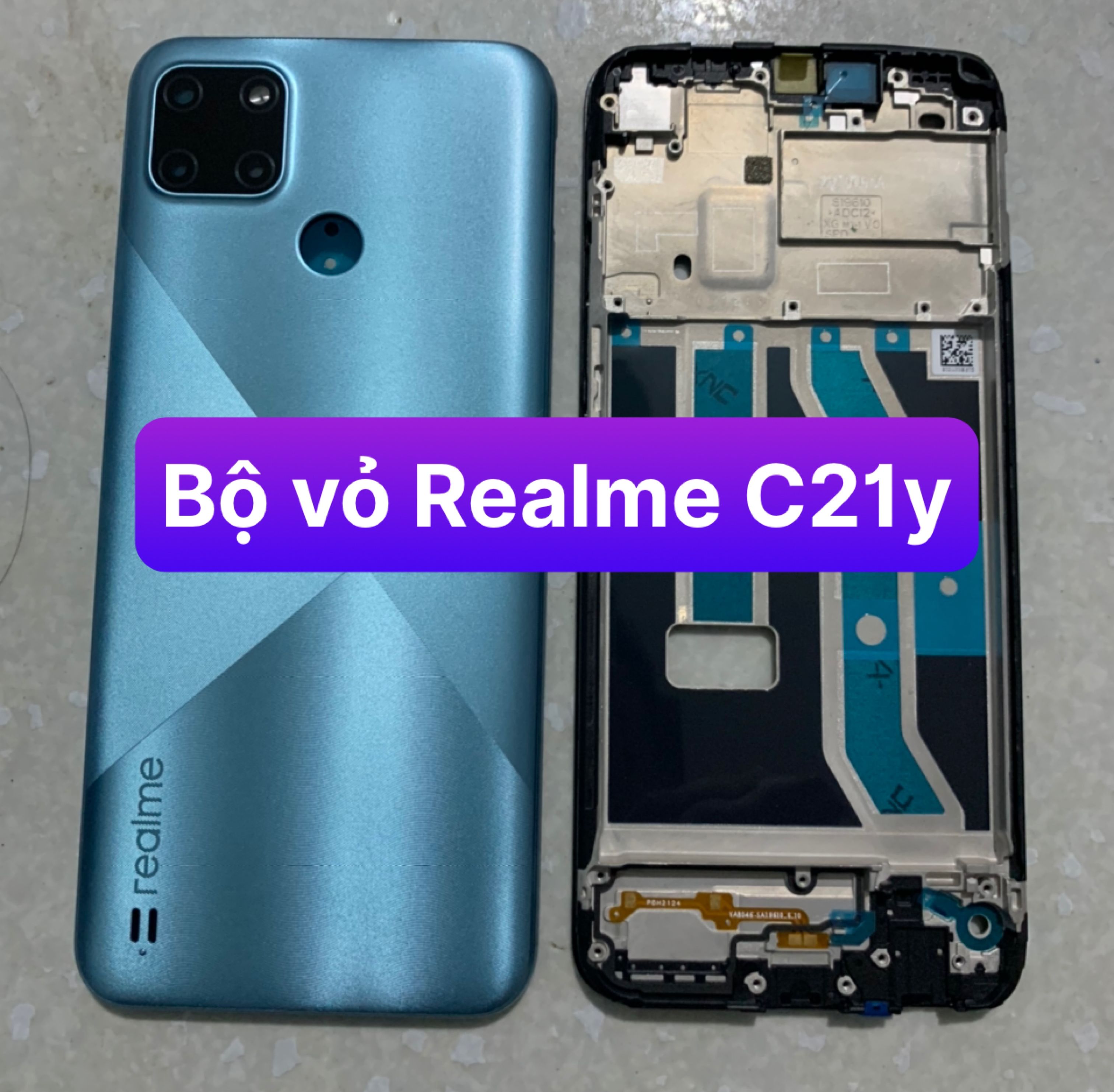 Bộ vỏ realme c21y gồm sườn, lưng,kính cam ,nút bấn