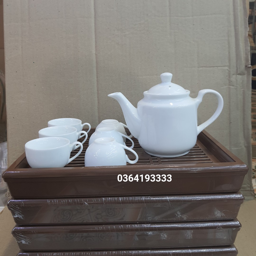 Bộ ấm chén sứ trắng Bát Tràng Ấm sứ trắng dáng trụ và 6 chén quả hồng có khay nhựa