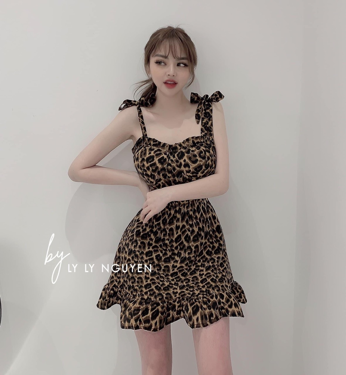 Đầm hai cột cột nơ họa tiết da beo - Đầm đuôi cá tiểu thư