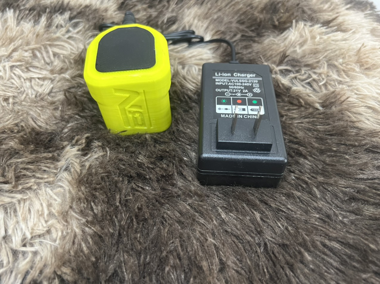 Củ Sạc Ryobi 12-18v Lion- Nimh-Nicd cho pin zin bằng adapter có bảo vệ và đèn báo đầy.