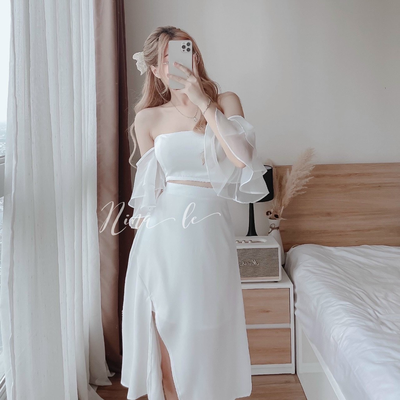 Sét áo trễ vai croptop có mút khóa kéo,tay phối voan tơ kèm chân váy xẻ tà sang chảnh điệu đà kwstdx176