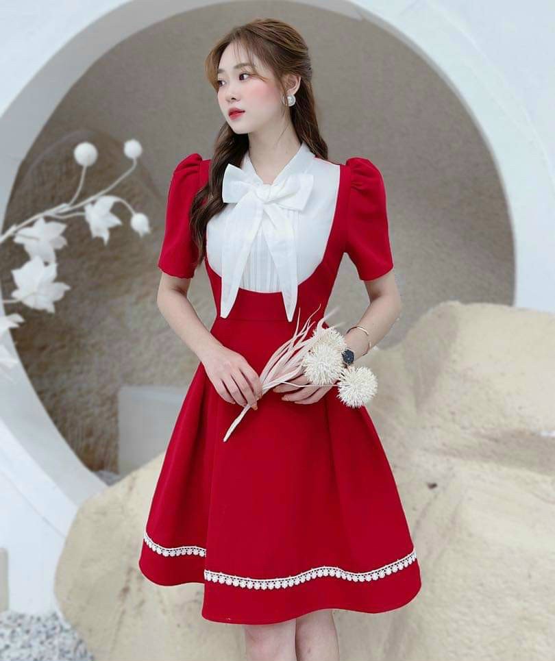 Đầm dáng xòe chạy viền cổ dập ly phối nơ