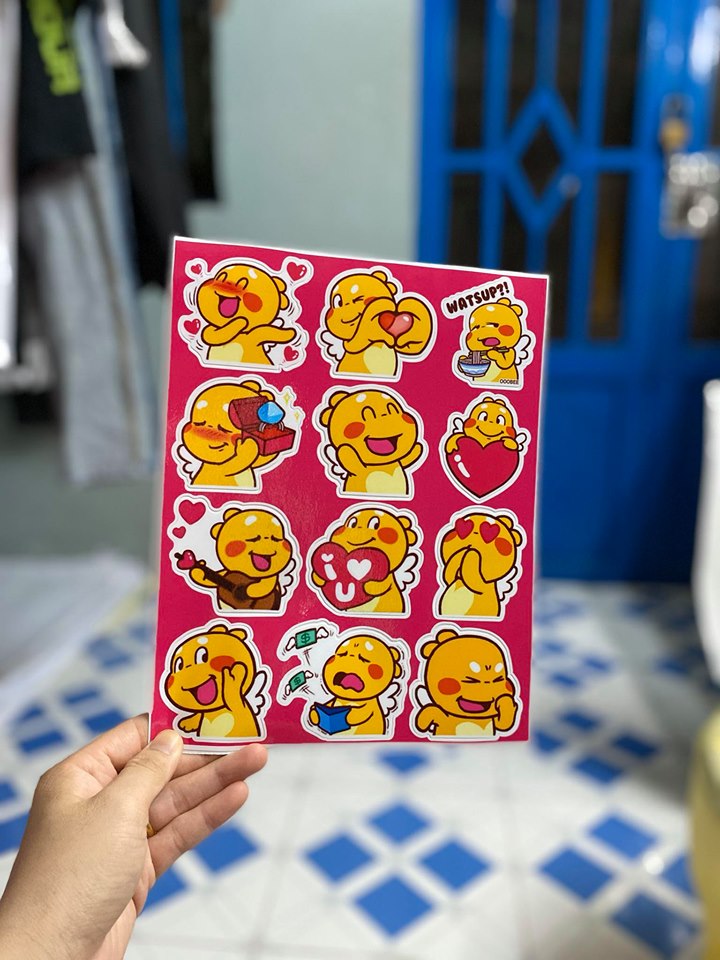 Tem logo khủng long vàng cười trái tim