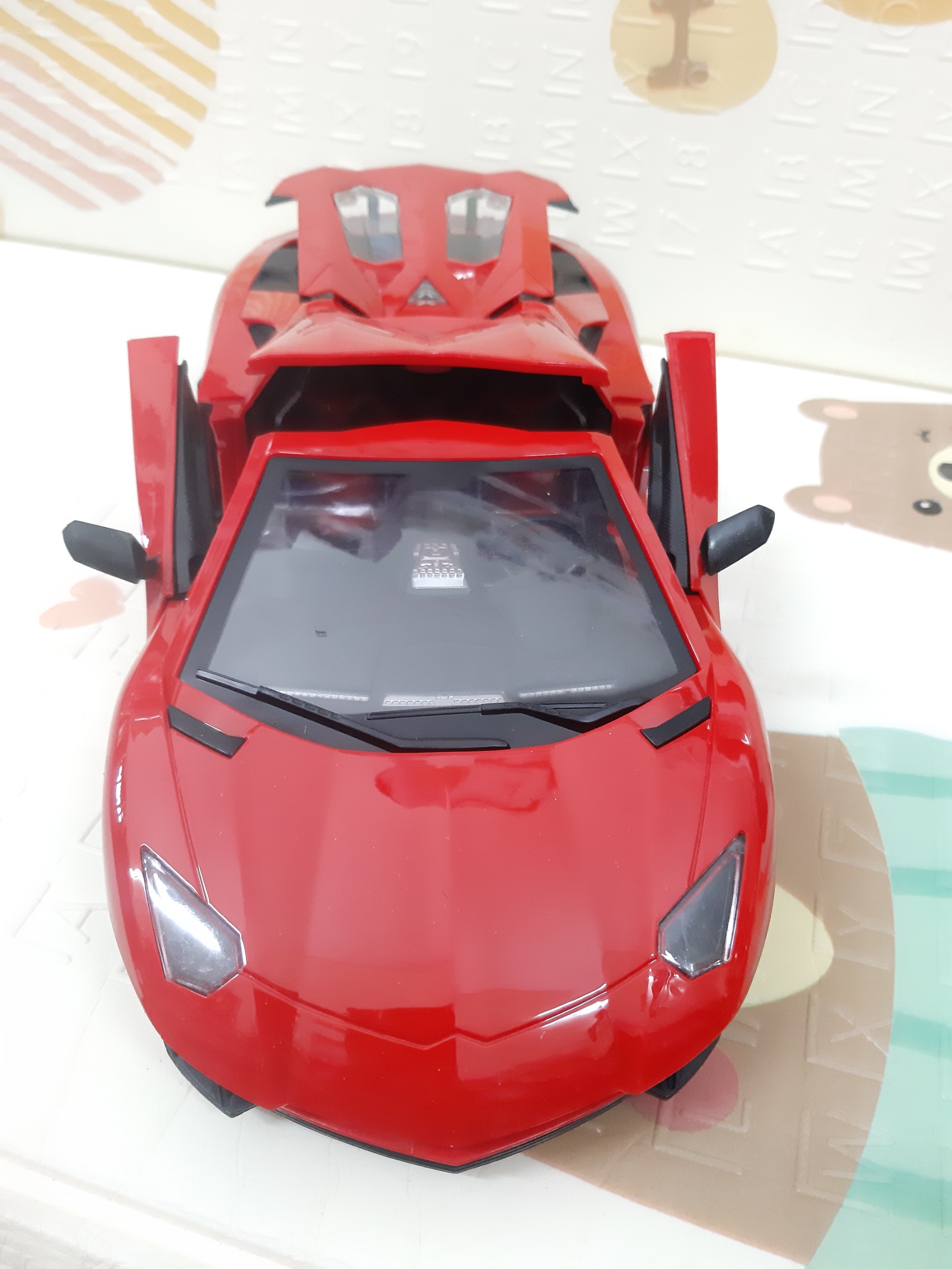 Đồ chơi ô tô điều khiển pin sạc 6Vtốc độ cao cửa đóng mở cao cấp, chạy với tốc độ cao có đèn trước siêu sáng, thiết kế giống như chiếc siêu xe hiện đại thời nay, Xe o to dieu khien dung pin sac cua dong mo
