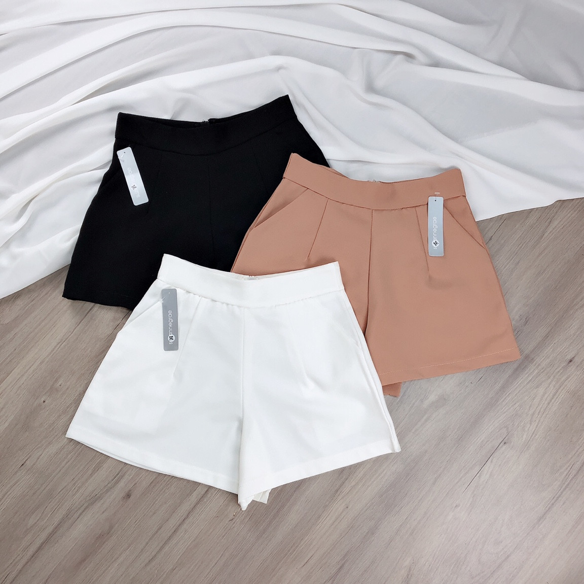 Quần short vải tuyết mưa dày dặn ống rộng phong cách nữ