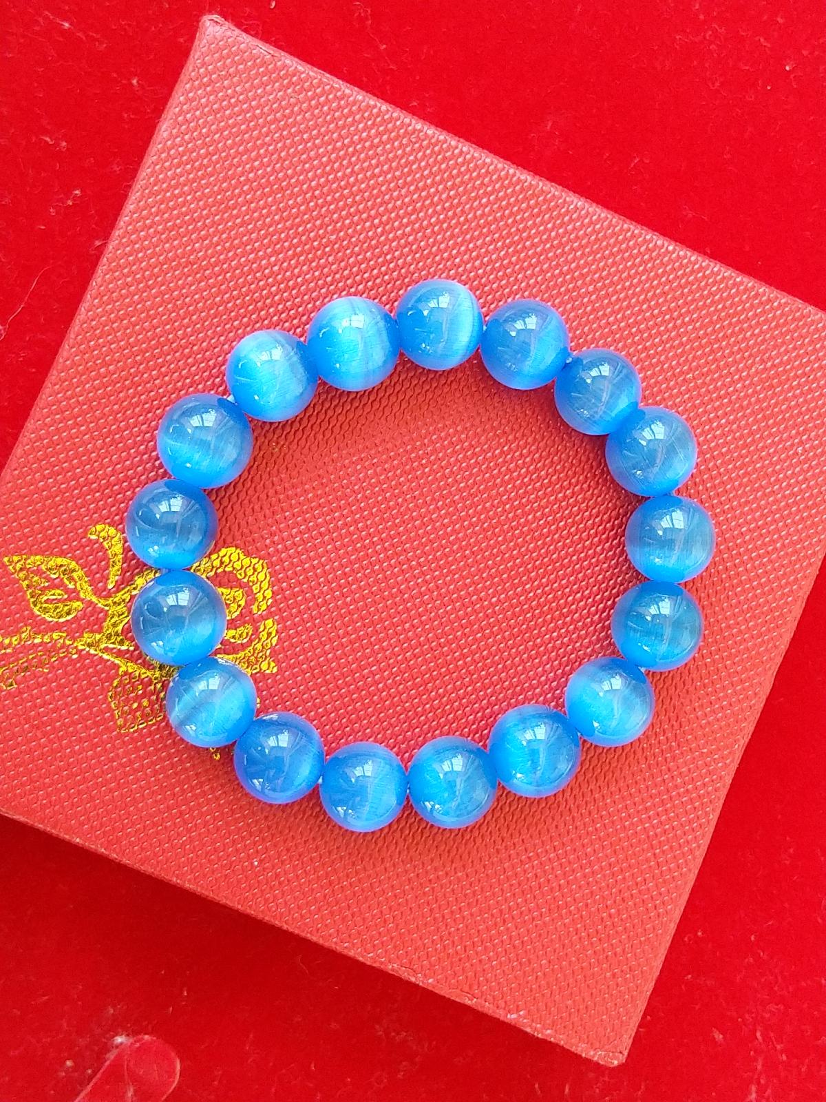 Vòng tay phong thủy đá mắt mèo xanh dương loại 10 mm, tốt cho người mệnh Thủy và mệnh Mộc.