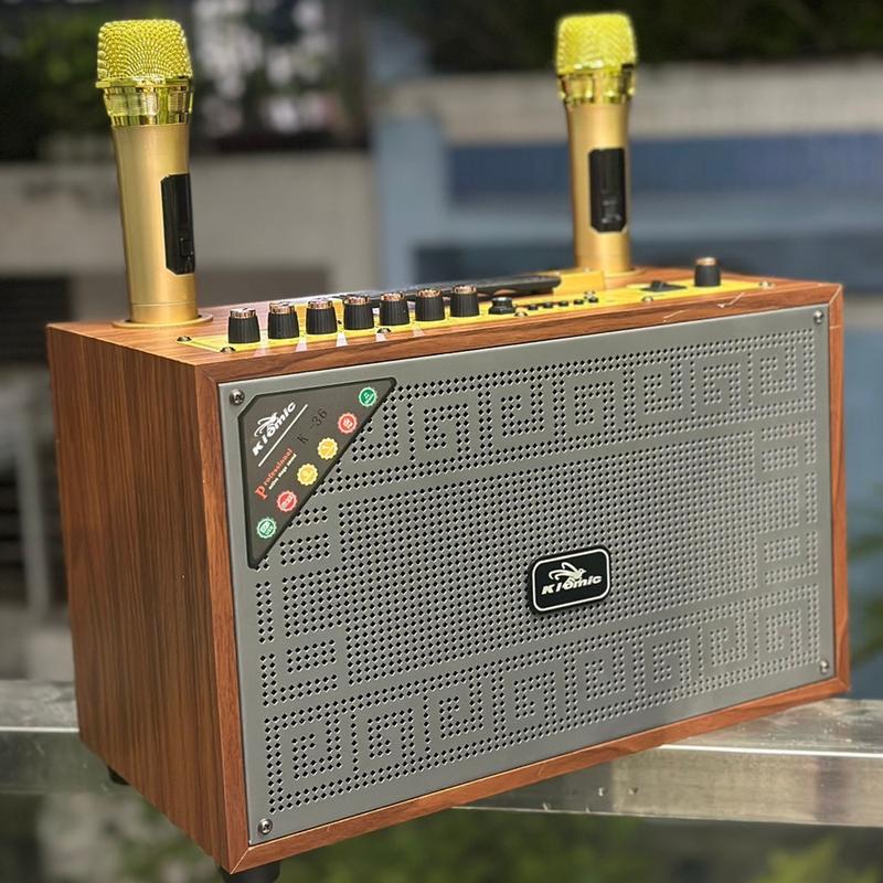 Loa Karaoke Xách Tay Kiomic K36 Bass 20Cm Kèm 2 Micro Chống Hú Công Suất 150W Chỉnh Bass, Treble Nhạc Riêng Biệt, Âm Thanh Cực Chất, Pin Bền Bỉ.