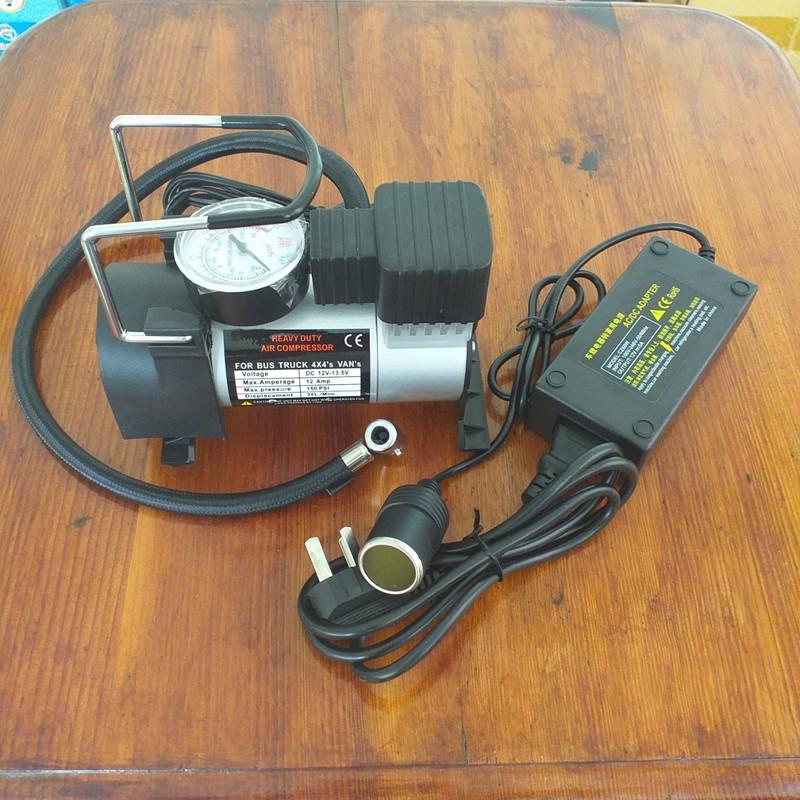 Bơm xe ô tô mini tặng kèm bộ chuyển nguồn 12v - Máy bơm xe mini