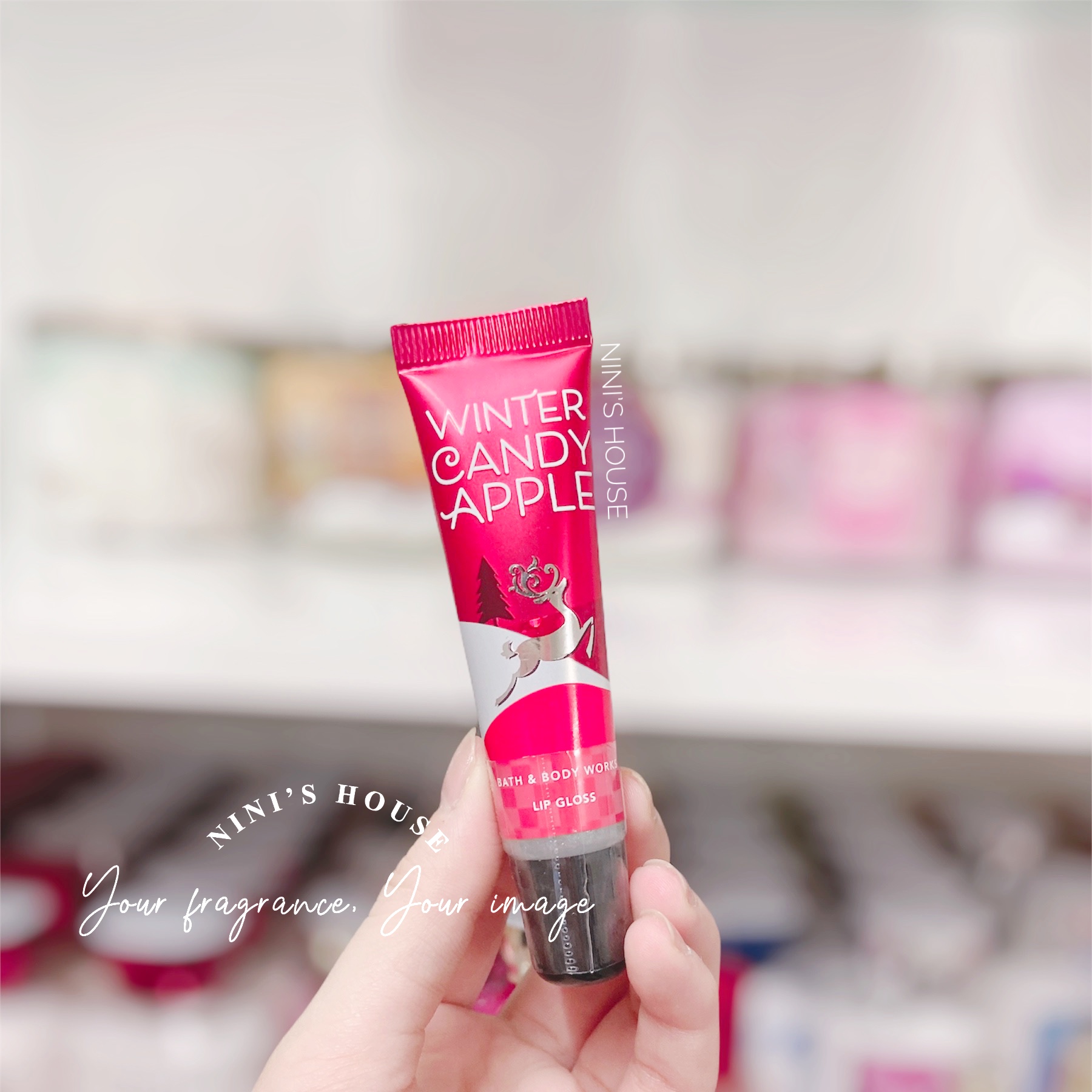 Son bóng nhũ dưỡng môi lip gloss Bath and Body Works hương Winter Candy Apple