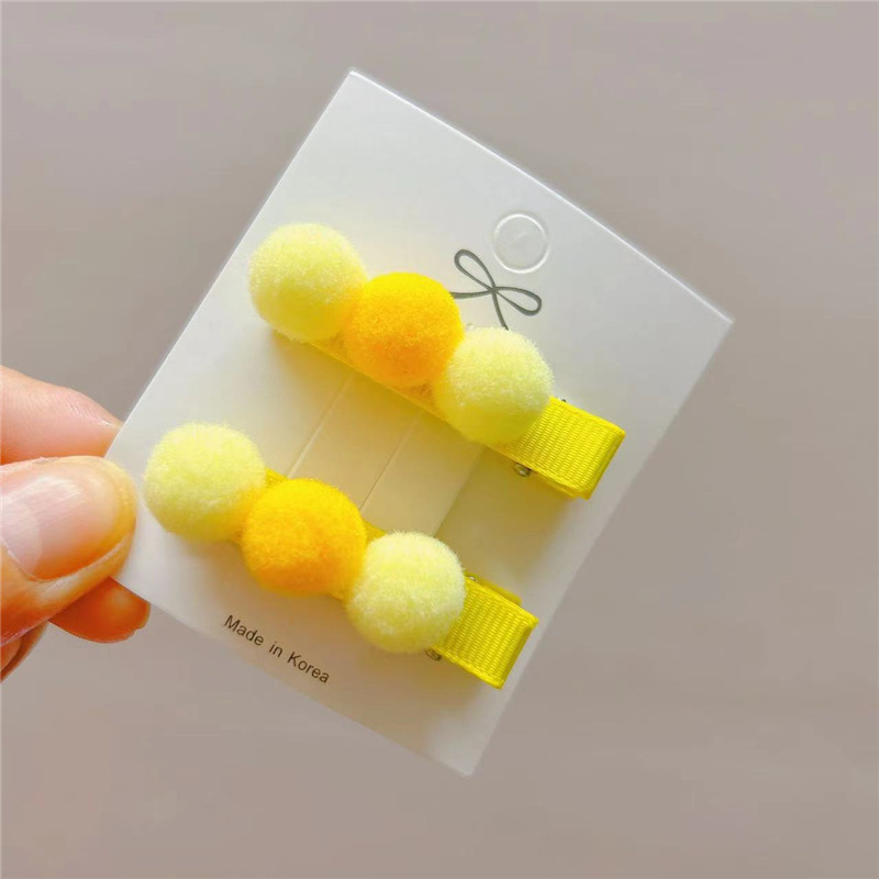 Set 2 kẹp tóc pon pon cho bé