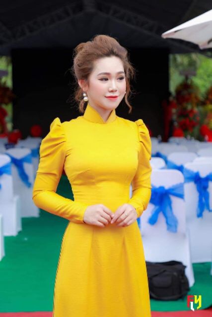 Bộ áo dài tây thi màu vàng vai bồng