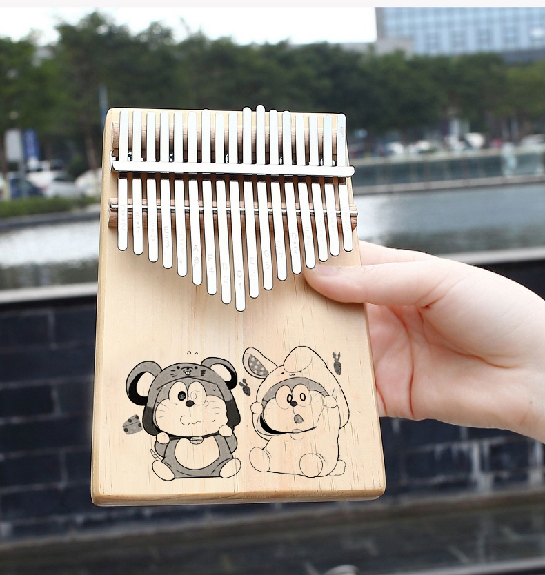 Đàn kalimba 17 phím khắc doremon tặng đầy đủ phụ kiện túi búa hướng dẫn tự học khăn lau dán phím 