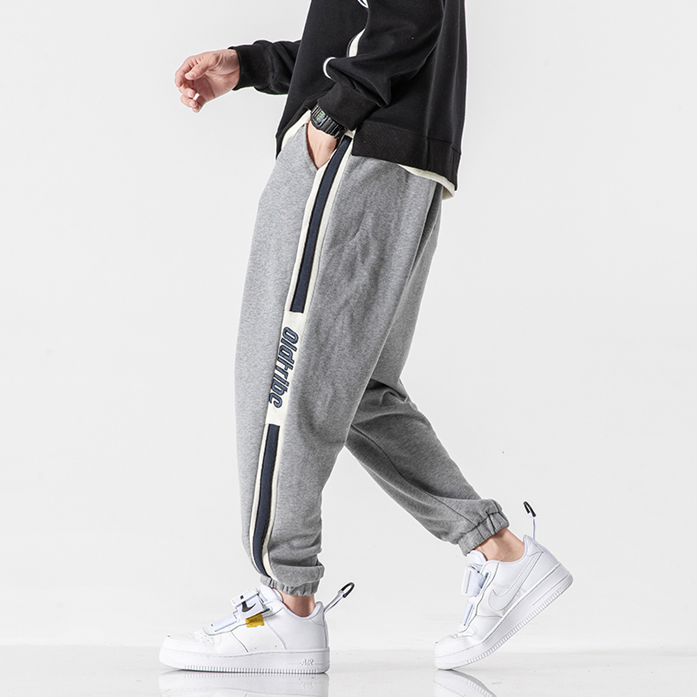 Quần Jogger Nam Bo Ống Dáng Thể Thao Phối Sọc Sườn Kèm Chữ Cá Tính Thời Trang SMARTLY GIRL JOGGER NAM 9000085