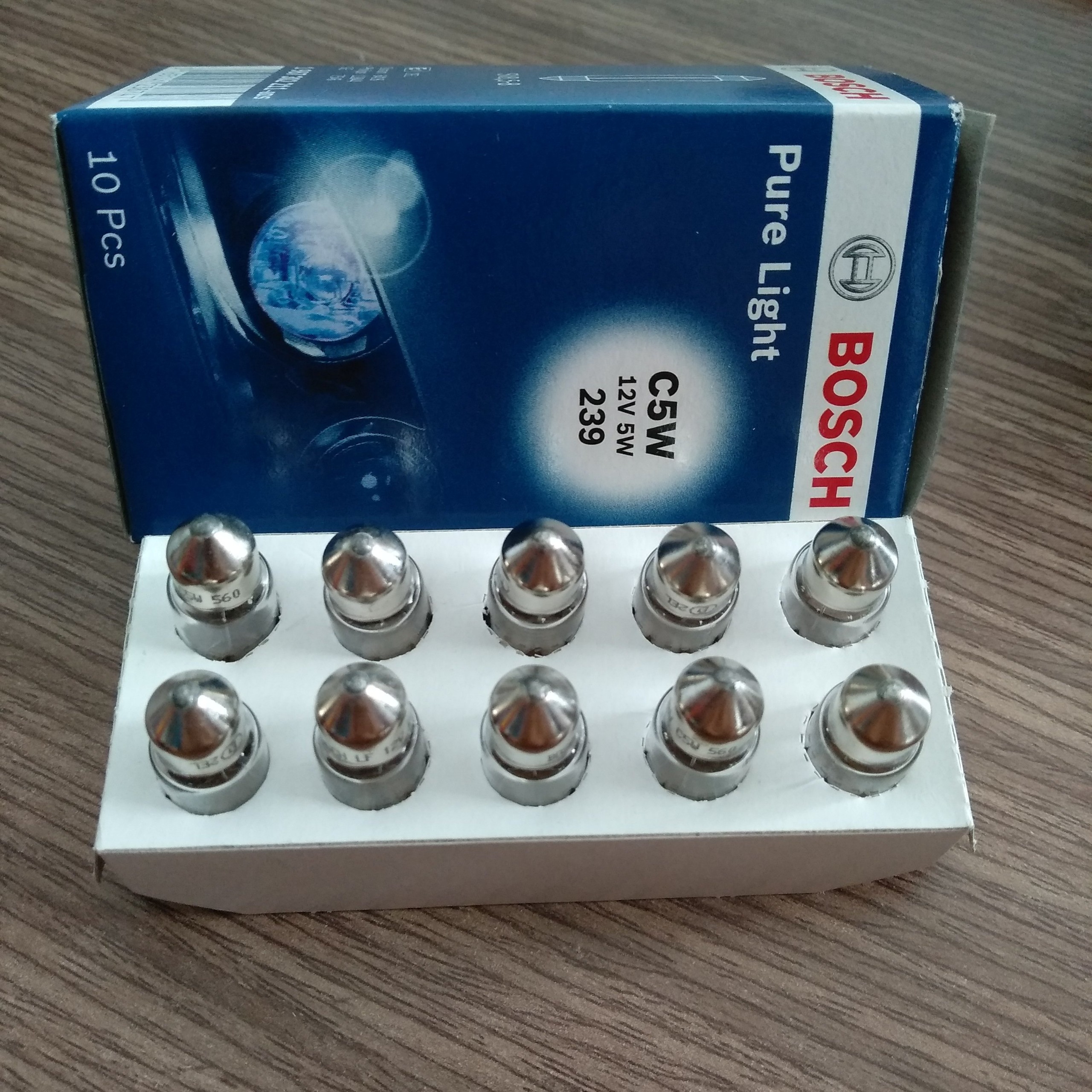 Bóng Đèn Bosch C5W 12V 5W ( Hộp 10 Bóng ) - Đèn Cốp , Đèn Biển Số , Đèn Hậu , Đèn Trần , Đèn Hộp Đựng Kính Mắt .
