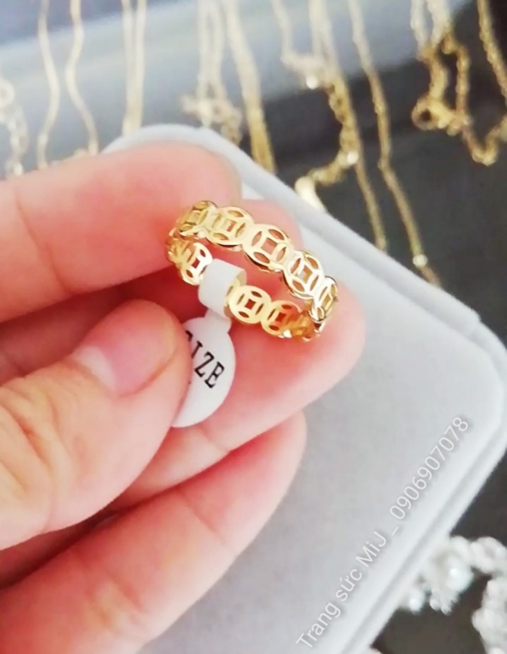 Nhẫn titan kim tiền vàng tươi