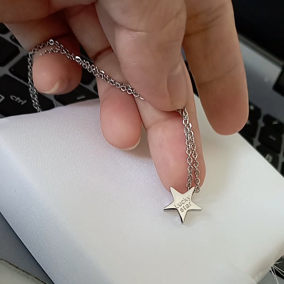 Dây chuyền titan ngôi sao trắng