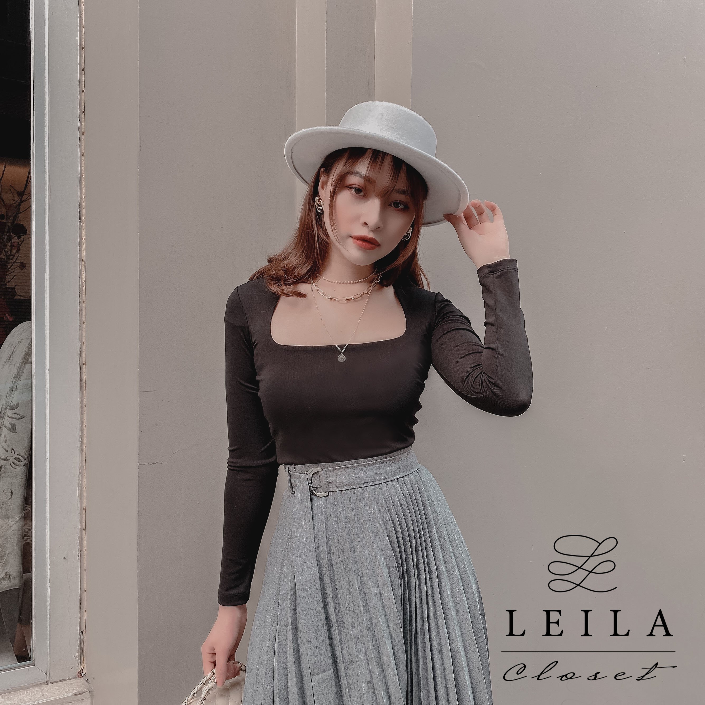 Áo MiMi cổ tam giác cách điệu Leila