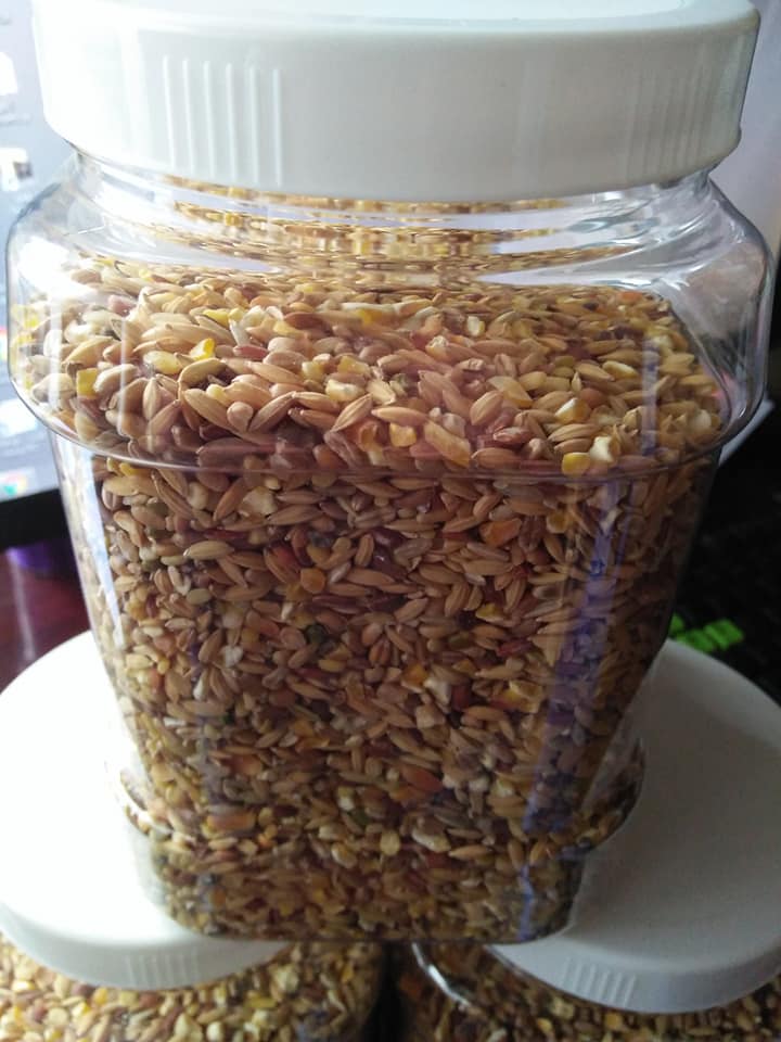 Hủ 1 kg ngũ cốc thức ăn chim bồ câu , gà tre