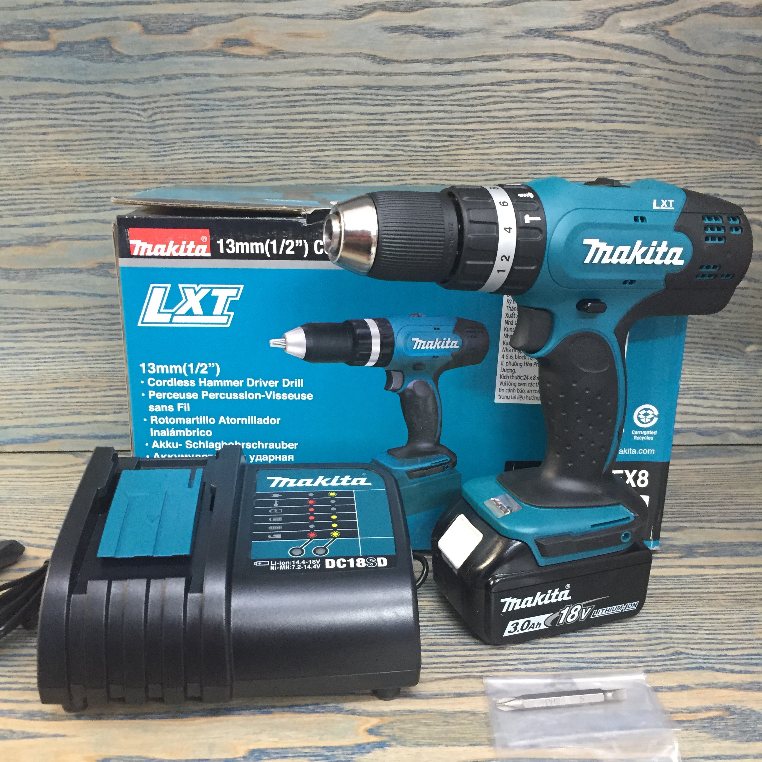 Chính hãng - máy khoan búa và vặn vít dùng pin 18v makita dhp453sfx8