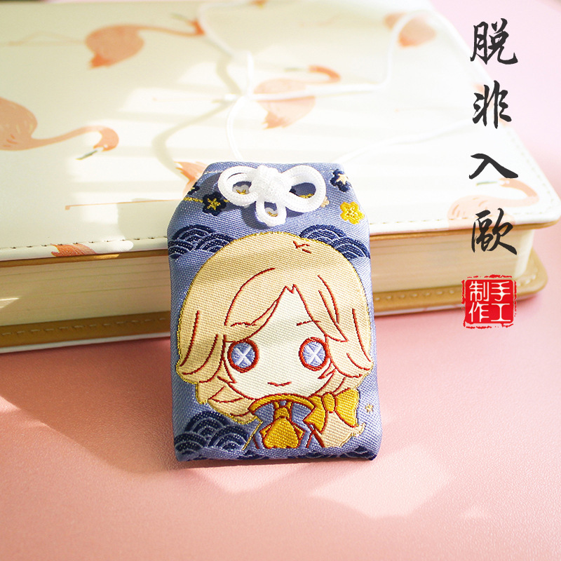 Túi gấm omamori ra nước ngoài tặng kèm đá ngũ sắc