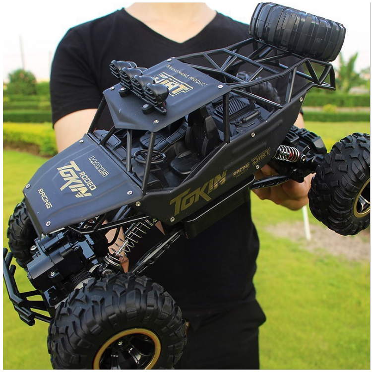 Mô hình xe ô tô địa hình cỡ lớn 1:12 điều khiển từ xa leo núi động cơ 2 cầu bánh hơi pin sạc 7.4v dung lượng cao 1200mAh SM-4P