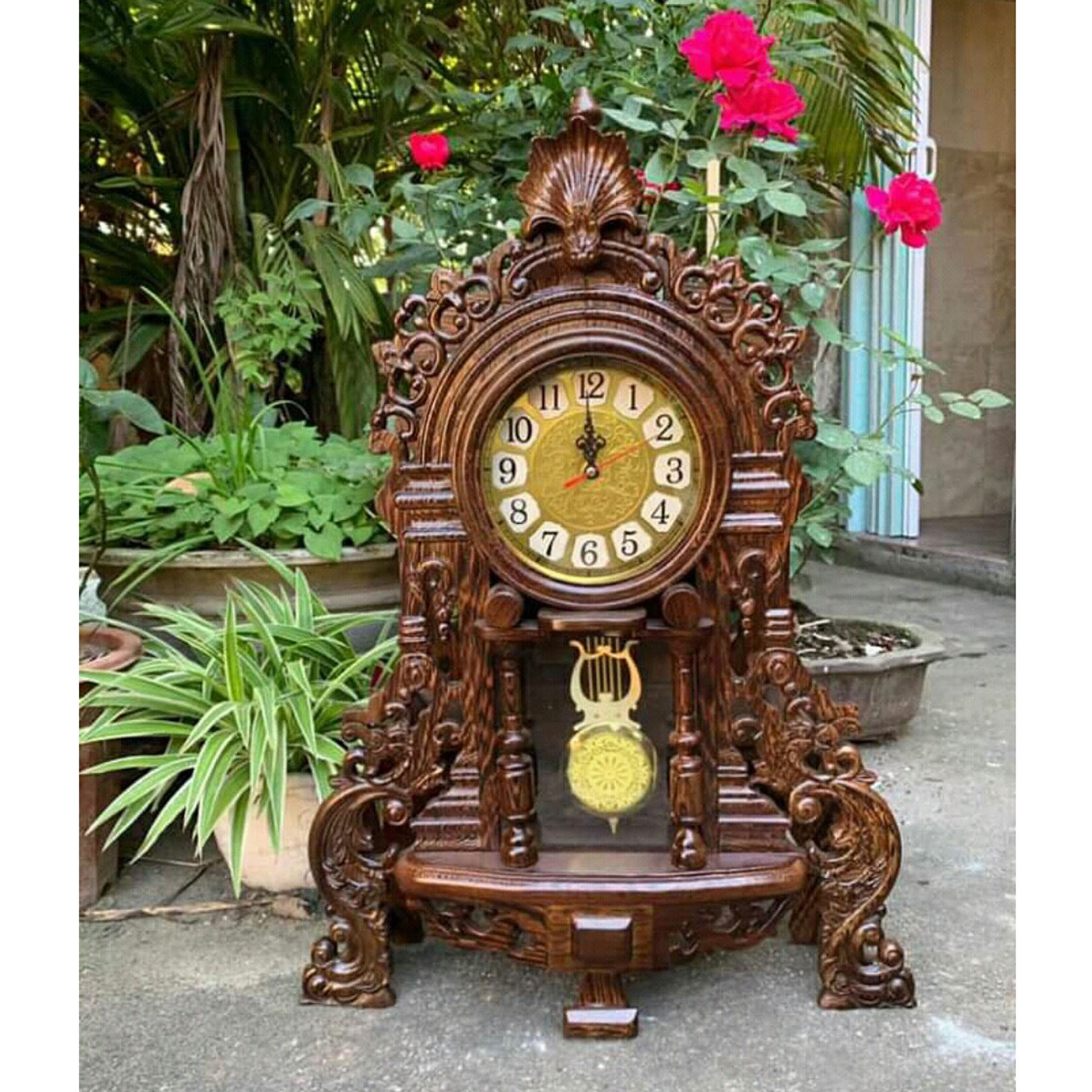 Đồng hồ đê bàn gỗ mun đuôi công, sang trọng,đẹp, bảo hành toàn quốc