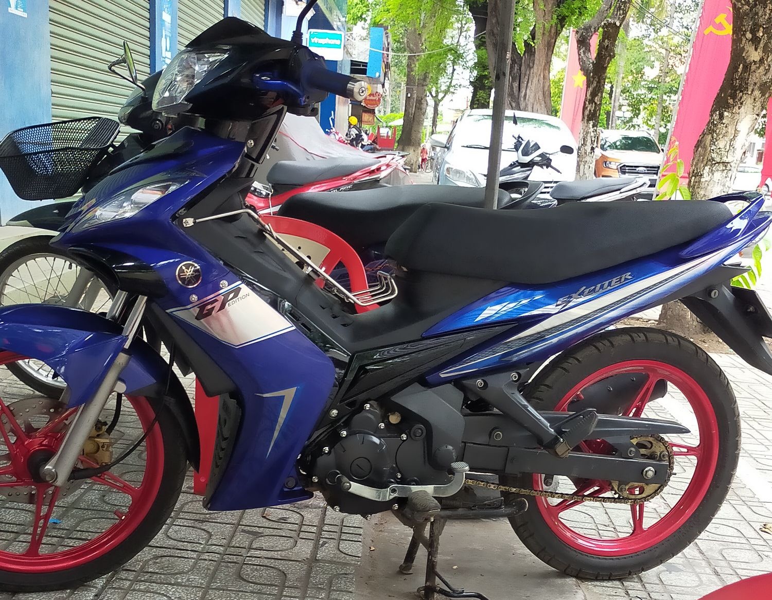 Tem exciter 2010 xanh bạc GP crom