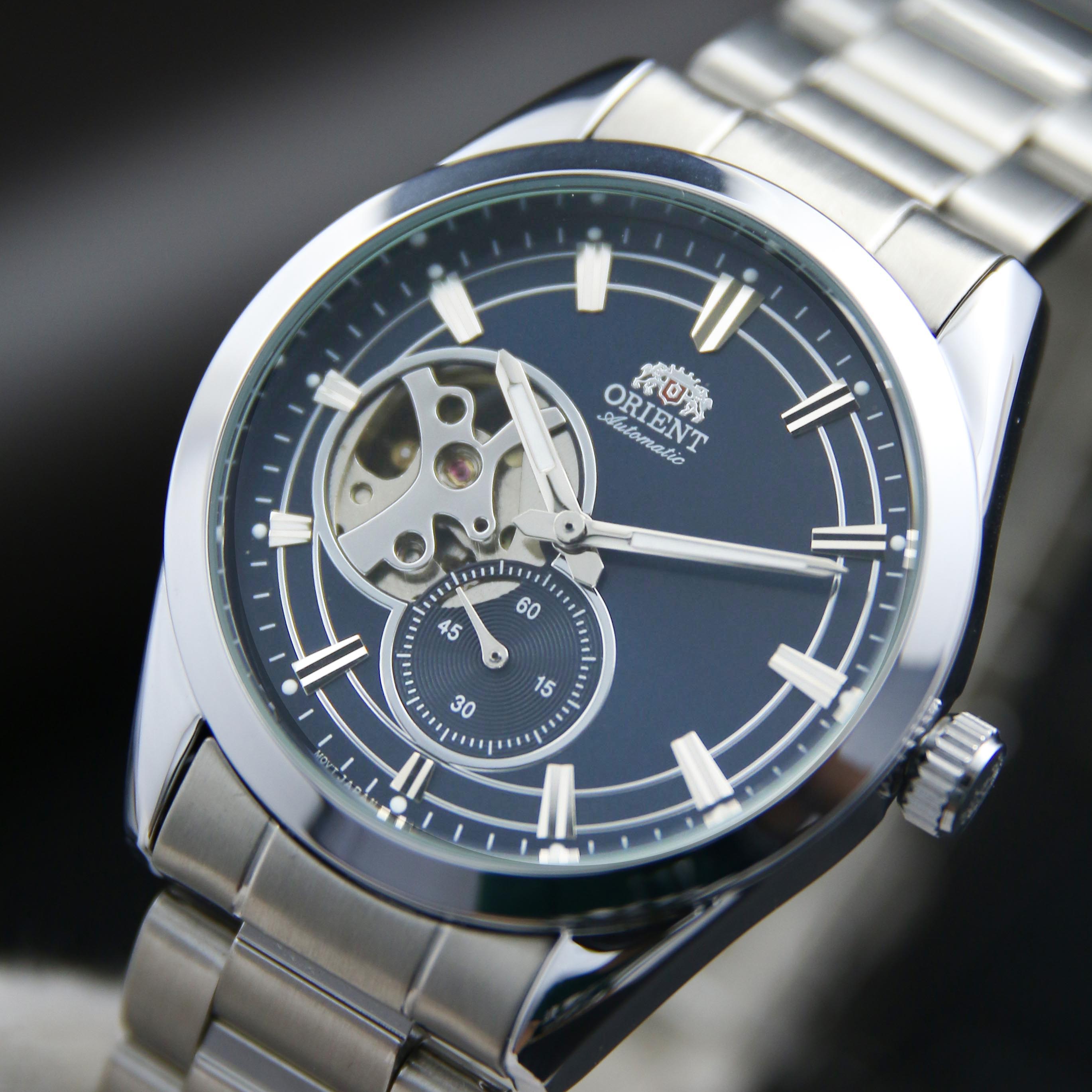 Đồng Hồ Cơ Nam Orient Skeleton OR6S Dây Thép không gỉ Kính Cong Đẹp Chống