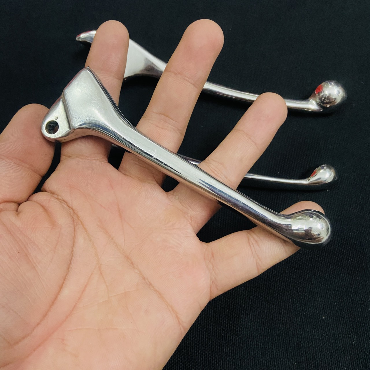 Tay thắng đùm dream inox đúc nguyên khối sáng bóng cho dòng xe dream