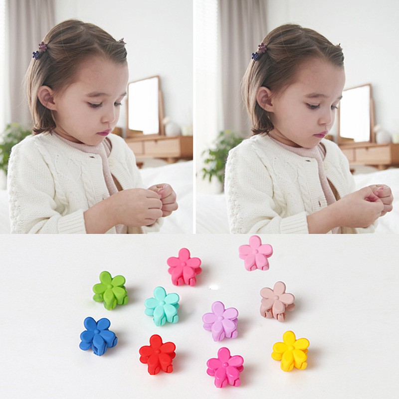 Kẹp tóc hoa nhí cho bé