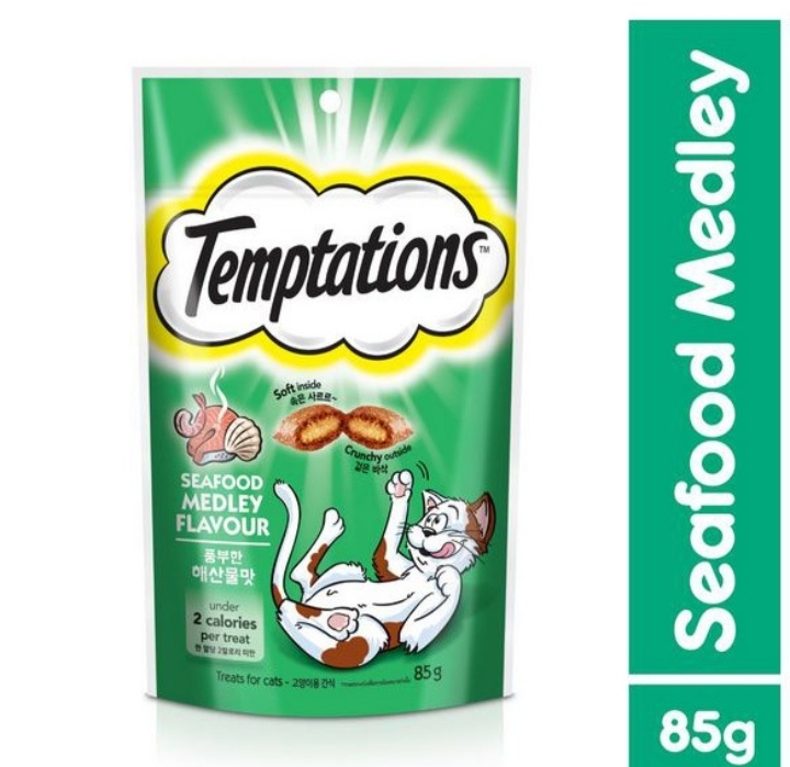 Thức ăn vặt cho mèo Temptations vị hải sản 85g