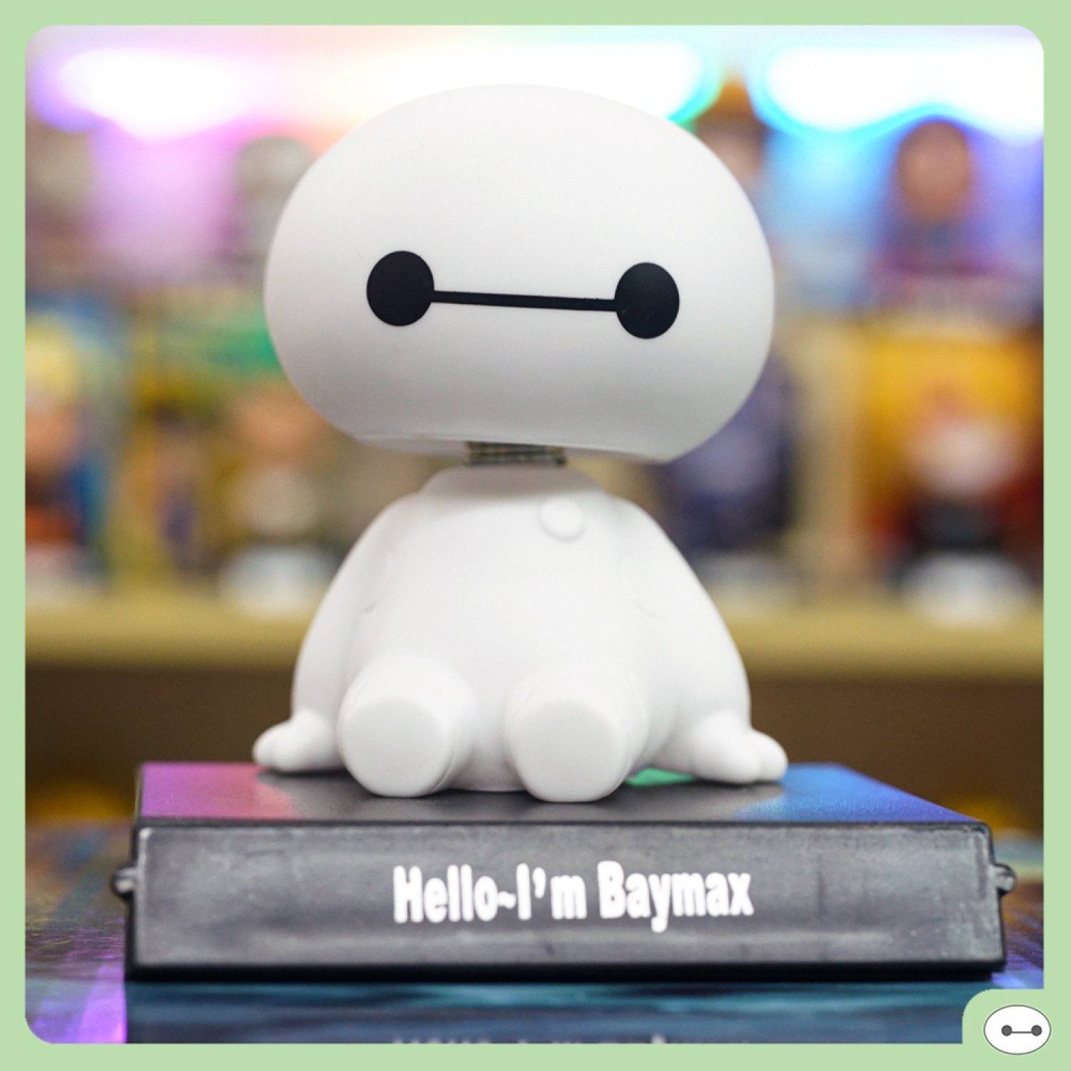 Đồ chơi mô hình baymax lắc đầu để ô tô kiêm đế kê điện thoại